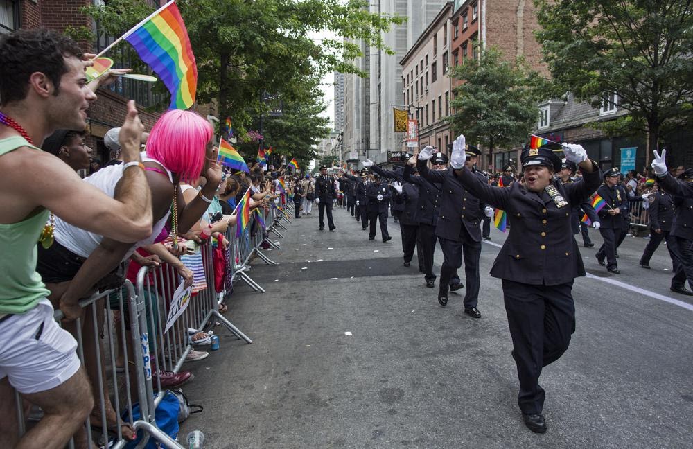 police officers marching at a pride parade