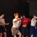 Fabi practicing choreography for Page 2 Stage with campers