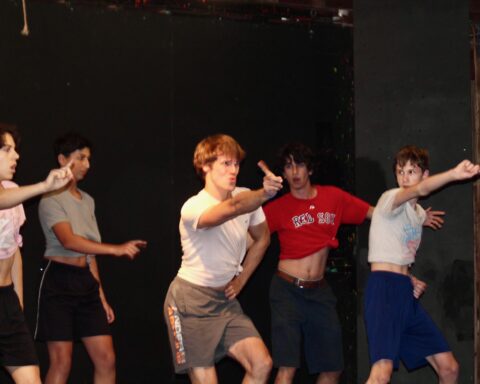 Fabi practicing choreography for Page 2 Stage with campers