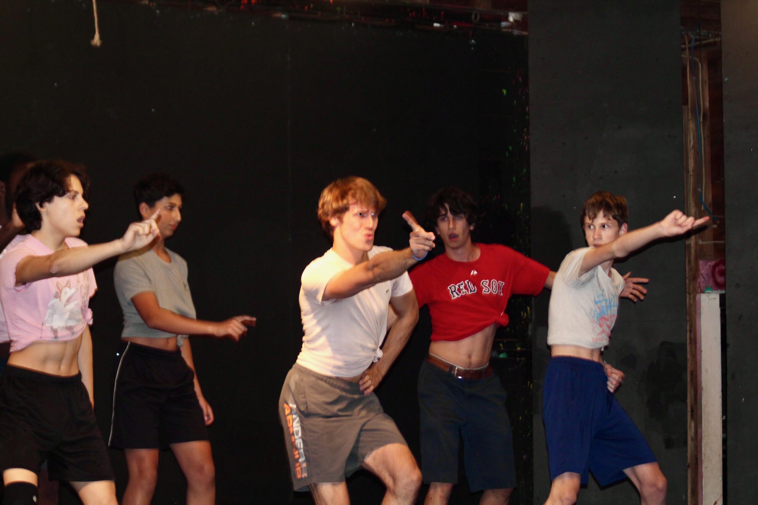 Fabi practicing choreography for Page 2 Stage with campers
