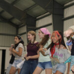 Girls about to perform a dance