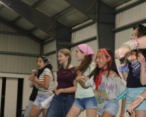 Girls about to perform a dance
